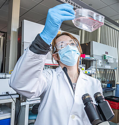 Female scientist working in a lab.