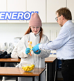 Regeneron employee working with student during the Regeneron Science Talent Search.