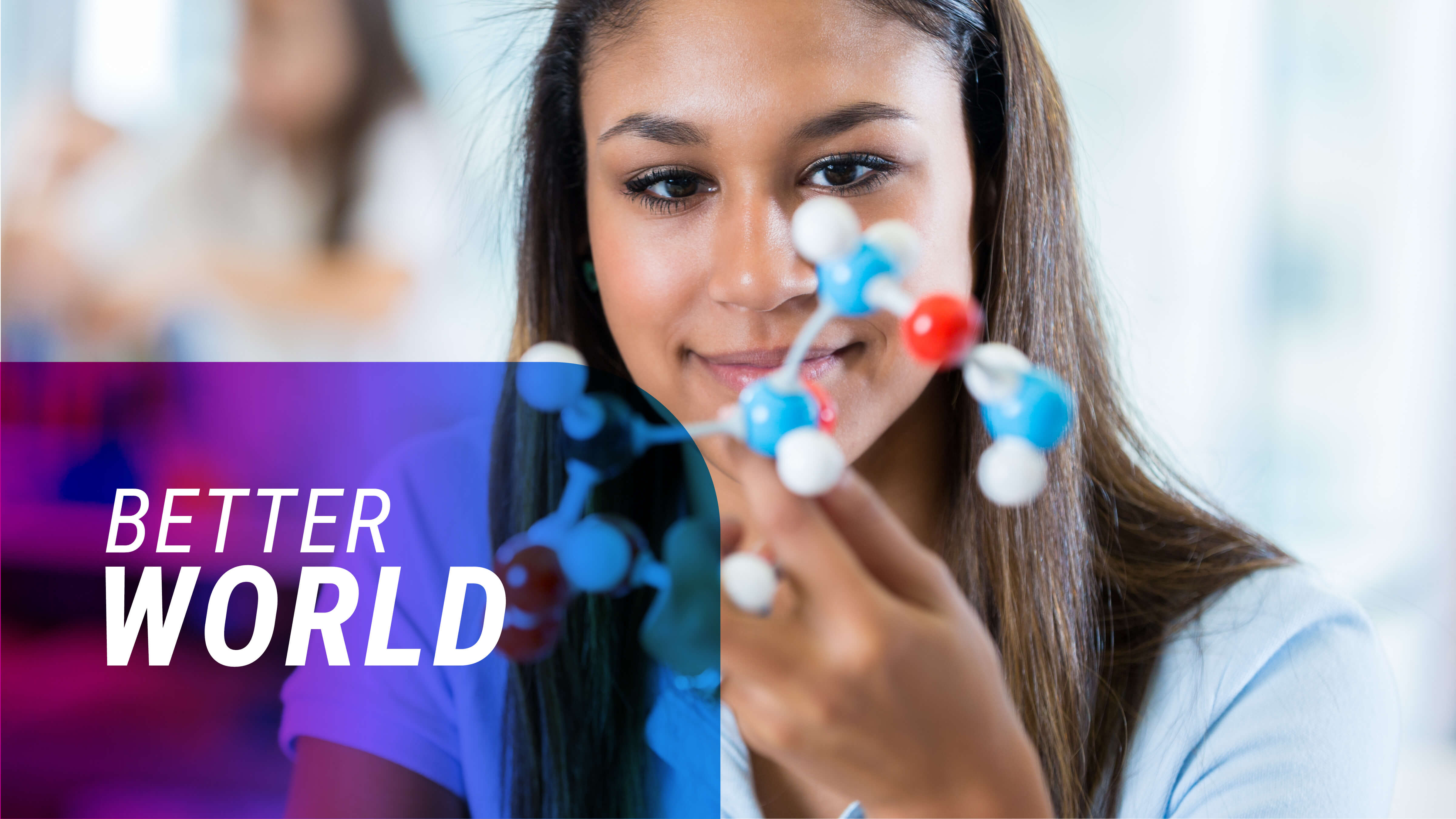 'Better World' text over an image of a female looking at a figure of a molecule.